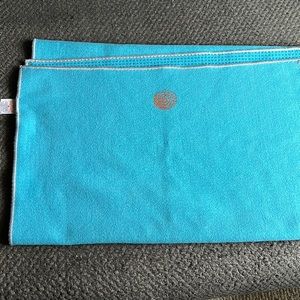 Used yogi toes Lululemon yoga mat with grips on the back.